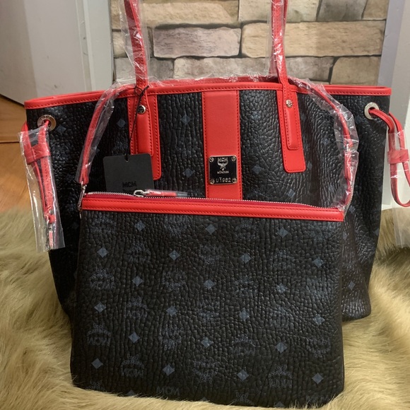 MCM Handbags - Authentic MCM Revers leather diamond tote/LG pouch